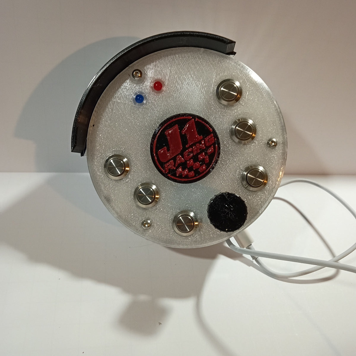 J1 SS white round USB button box photographed on a white backdrop