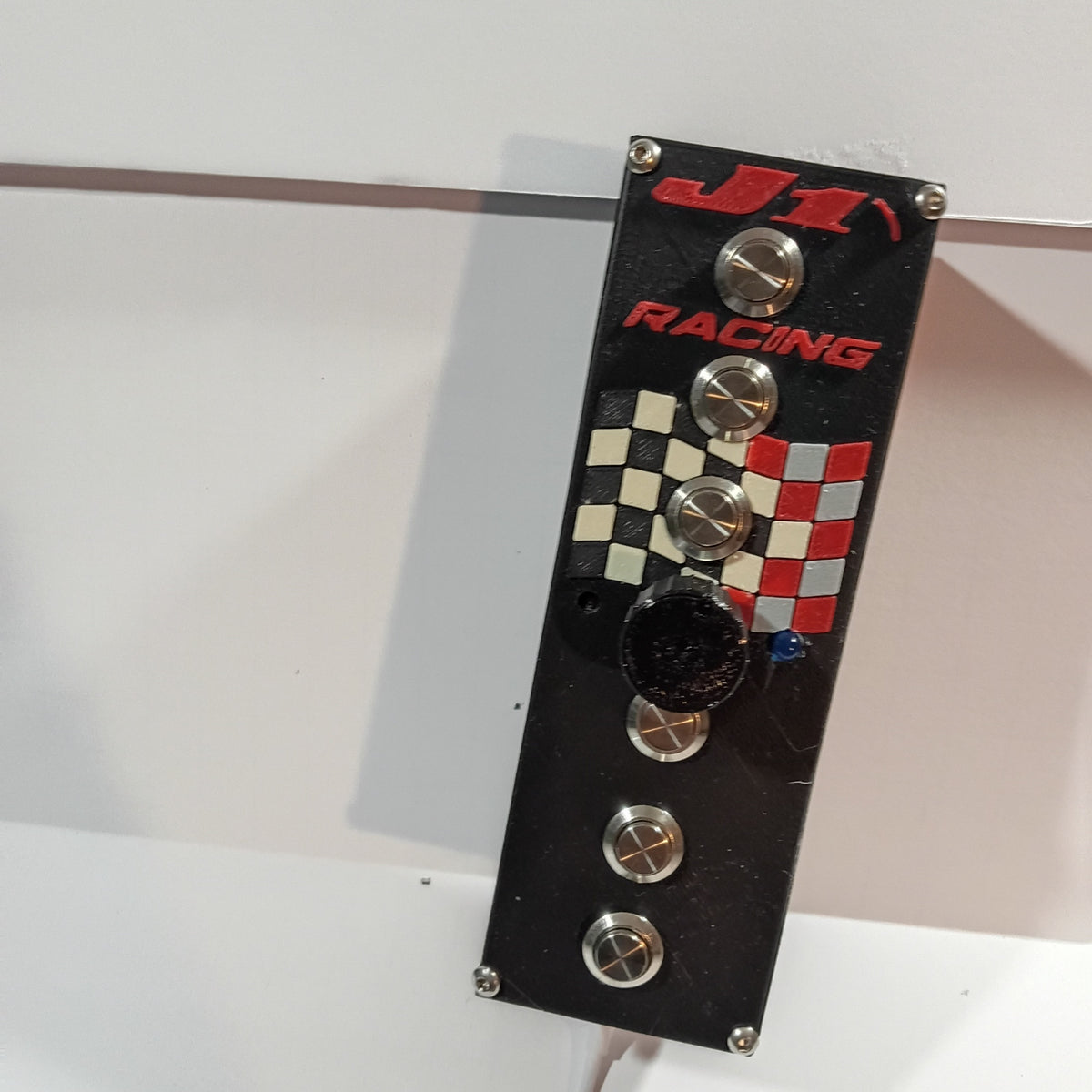 J1 SS V4 vertical USB button box on a white backdrop